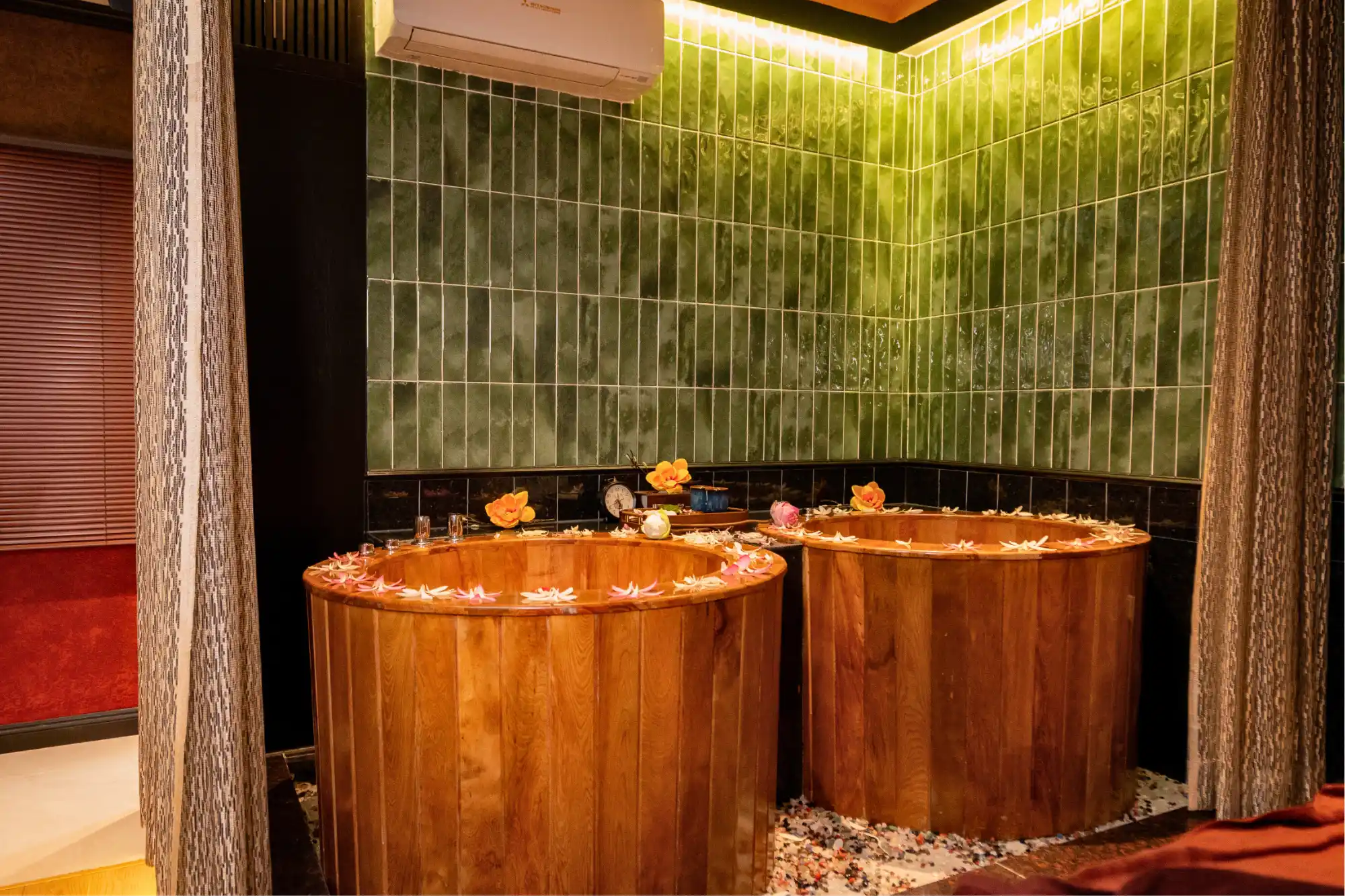 Discover the traditional bathing experience with warm water and natural herbs